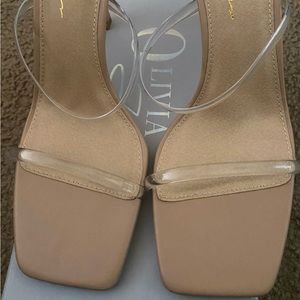 New, never worn, box a little damaged, size 8.5.  Clear and Tan.